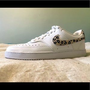Nike Court shoes with Leopard print swoosh
